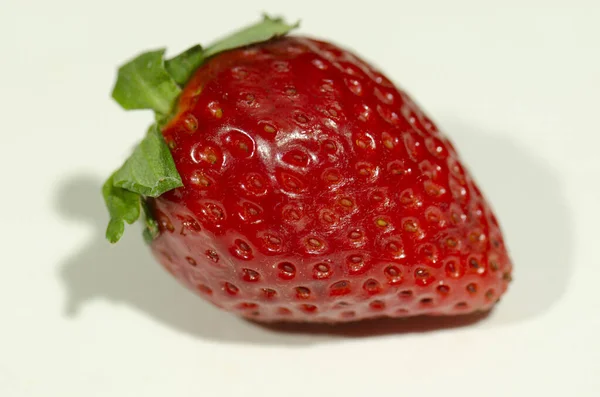 Strawberry on a white background with drop shadow