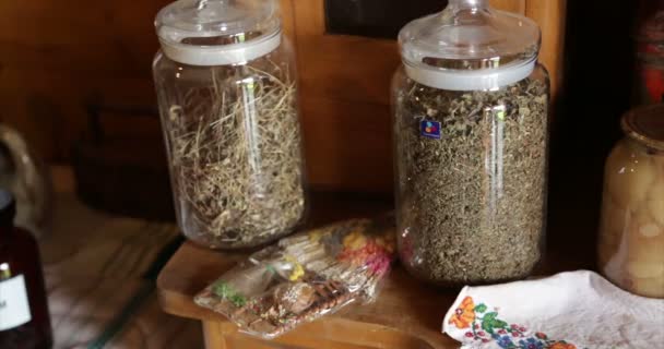 Ukrainian authenticity. Home village. Interior. Jars with herbs. — Stock Video