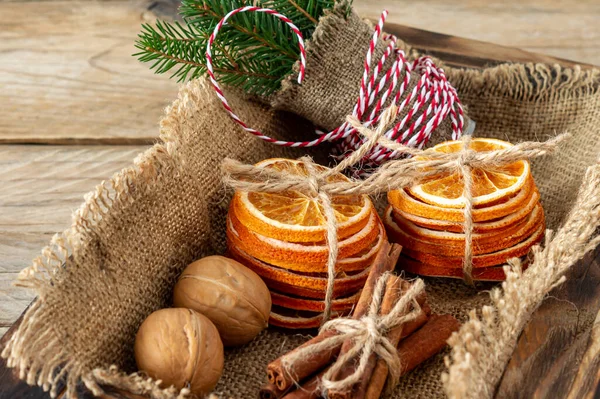 Rustic Christmas Composition Dried Oranges Cinnamon Sticks Fir Tree Branches — Stock Photo, Image
