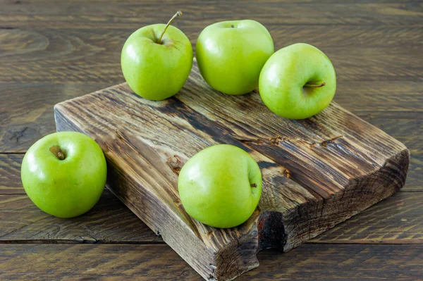 stock image Green ripe apples on wooden desk. Rustic style. eco-friendly farming. sustainable food.