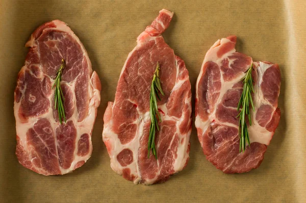 Top View Fresh Choped Pork Steakes Rosemary Baking Paper Ready — Stock Photo, Image