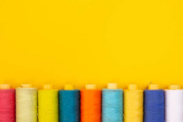 Top View Colored Thread Coils Yellow Background Sewing Place Text — Stock Photo, Image