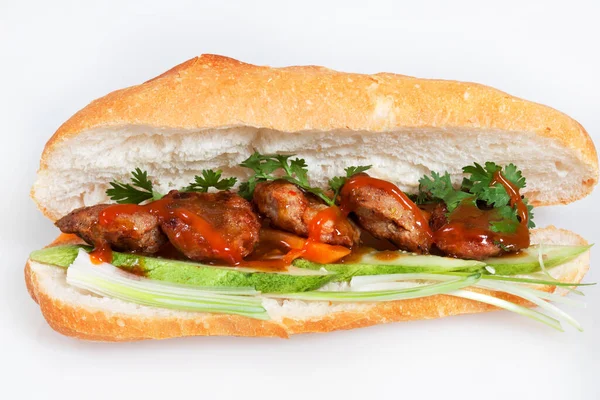 Meşhur Vietnam yemekleri banh mi thit, hammaddeyle doldurulmuş ekmeğin popüler sokak yemekleri: ızgara domuz eti ve soğan, kişniş, havuç, salatalık, biber gibi taze otlar. Beyaz Üzerine