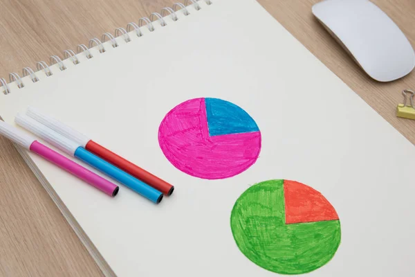 Pie chart icon drawn on notebook