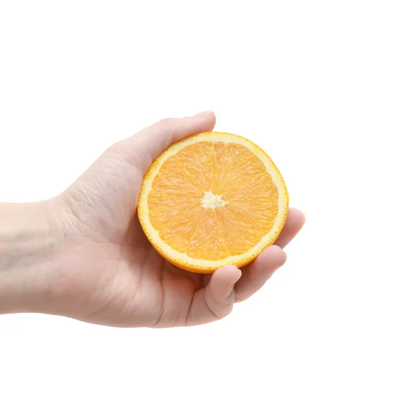 Laranja em uma mão feminina isolada em um fundo branco — Fotografia de Stock