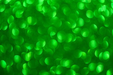 Bokeh ve Sparkles 'ın yeşil arka planı