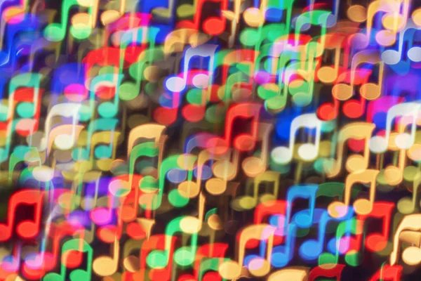 Renkli nota şeklinde bir arkaplan bokeh.