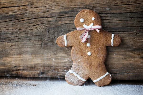 Gingerbread man, people on wood, suitable snow and winter — Stock Photo, Image