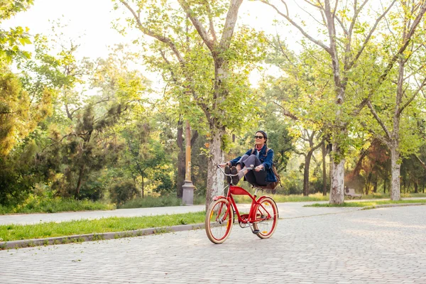 Female riding bicycle — Stock Photo, Image