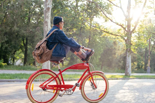 Female riding bicycle — Stock Photo, Image