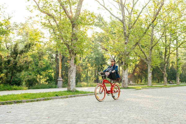 Female riding bicycle — Stock Photo, Image