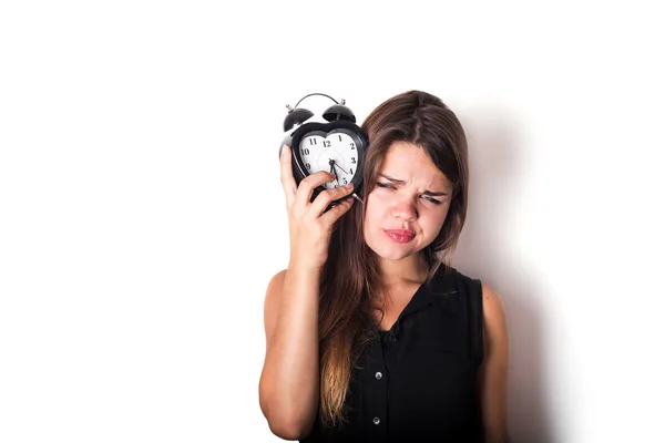 Smiley businesswoman holding alarm clock. isolated on white back — Stock Photo, Image