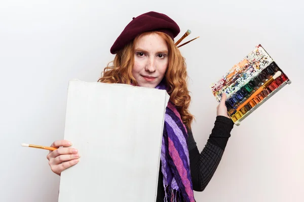 Redhead woman painter Stock Image