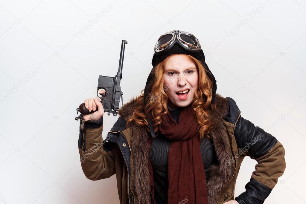 redhead girl with vintage mauser gun