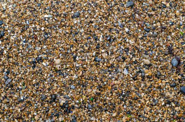 Deniz çakılları. Çakıl taşı plajı. Dekoratif deniz taşları. Taşın yapısı..