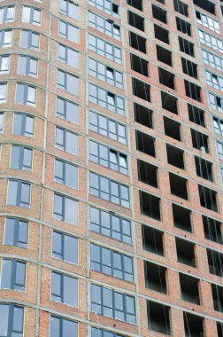 İnşaat alanı. Ev yapımı. Somut yapılar. Gökdelen. Bir ev inşa etmek.