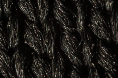 Siyah naylon örgü kumaş lifleri mikroskop altında
