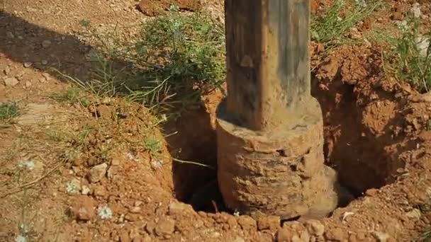 Tractor with a drilling device at a construction site — Stock Video