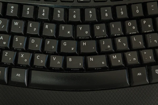 Teclado con letras en hebreo e inglés —  Fotos de Stock