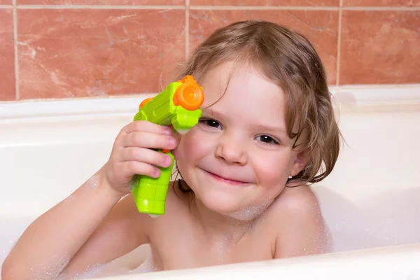 Little girl taking bath with foam Stock Photo by ©hdmphoto 100909278