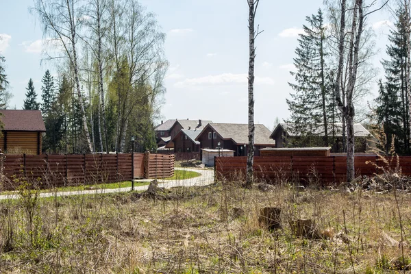 New wooden country house in forest — Stock Photo, Image