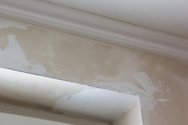 rough plaster corner of window opening