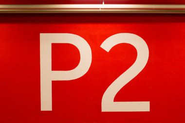 P2 huge sign painted on the red wall clipart
