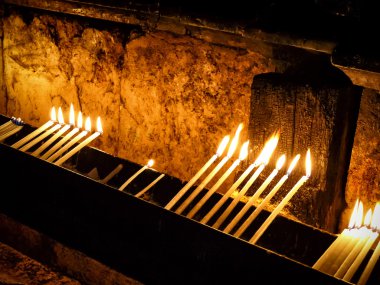 Candles in the temple of the Holy Sepulchre, Jerusalem clipart