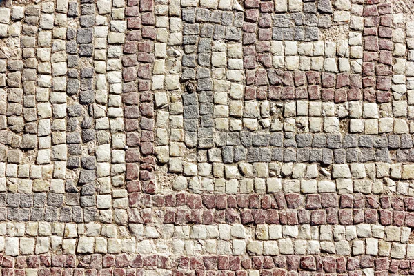 Zemin mozaik arka plan, Kato bölgesindeki eski harabe evde fayans deseni, Paphos, Kıbrıs. Eski kentteki Yunan iç dekorasyonu. Küçük taş desenli yüzey.