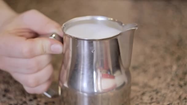 Barista stirs the milk and making cappuccino. Close-Up. — Stock Video