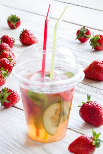 fresh lemonade with strawberries , kiwi and mint