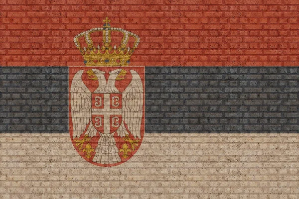 Bendera Serbia Pada Latar Belakang Dinding Bata Tua — Stok Foto