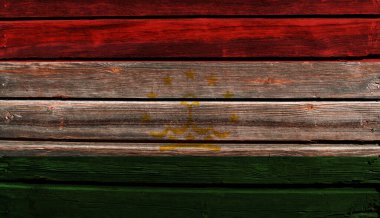 Tahta bir arka planda Tacikistan 'ın 3D bayrağı.