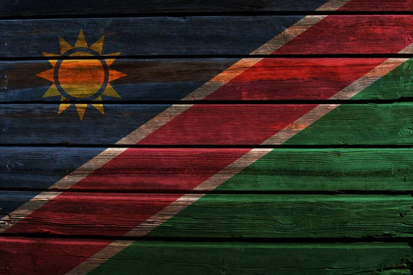 Vlag Van Namibië Een Oude Houten Muurachtergrond — Stockfoto