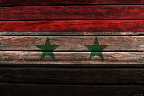 3D Flag of Syria on a old wood wall background.