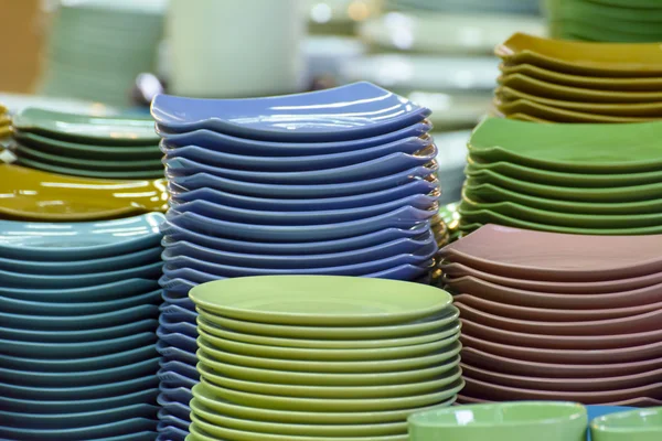 Stack of multicolored plates its was tile — ストック写真
