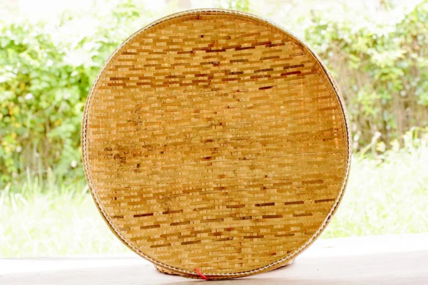 Basketwork contains earthenware steamer and threshing basket. — ストック写真