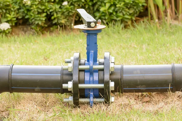 Big water pipe with valve. — Stock Photo, Image