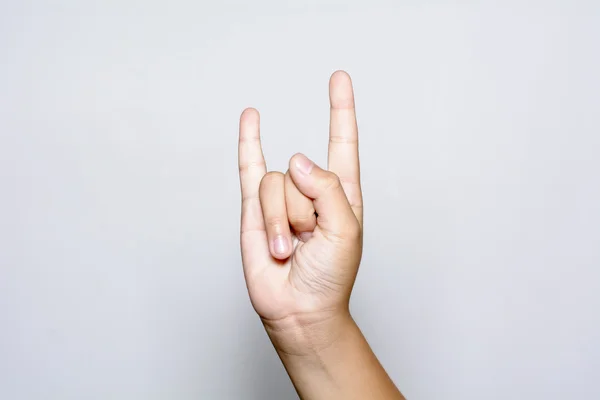 Muestra la mano del niño el signo de Rock and Roll — Foto de Stock