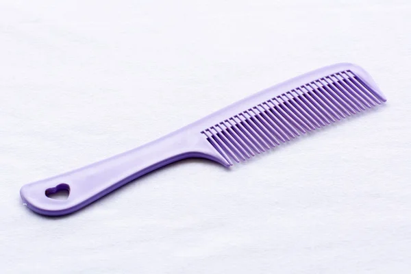 Purple hair comb — Stock Photo, Image