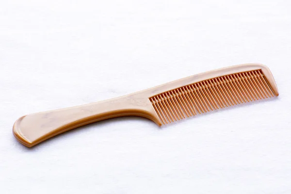 Kahverengi saç tarağı — Stok fotoğraf