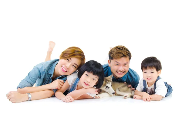 Asian family and pet — Stock Photo, Image