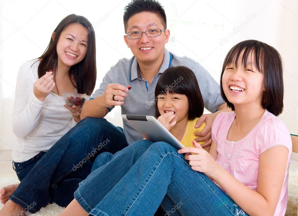 Asian family relax at home