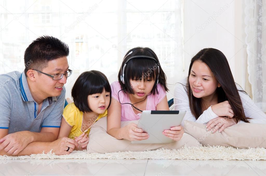 Asian family relax at home