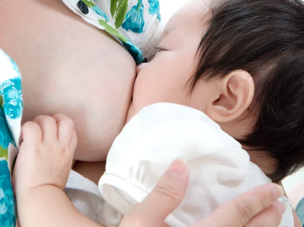Dziecka picia mleka kobiecego — Zdjęcie stockowe
