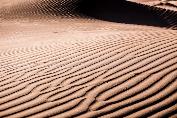 Рябь на песке — стоковое фото