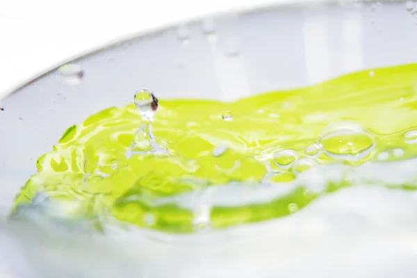 Water drips into the bowl with splashes