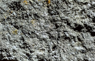 Arka plan gri taş dokulu, atış kapatın.