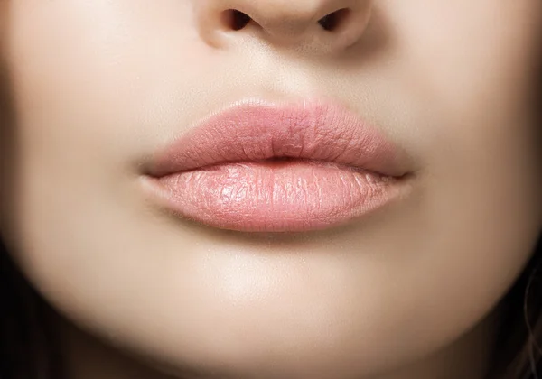 Part of face,young woman close up. Sexy plump lips without makeu — Stock Photo, Image