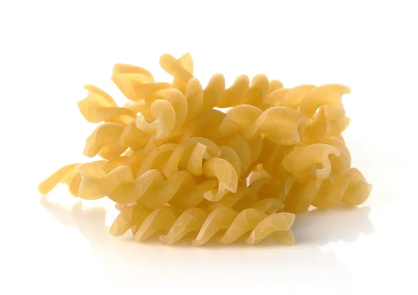 Pile of fusilli pasta isolated on white background — Stock Photo, Image